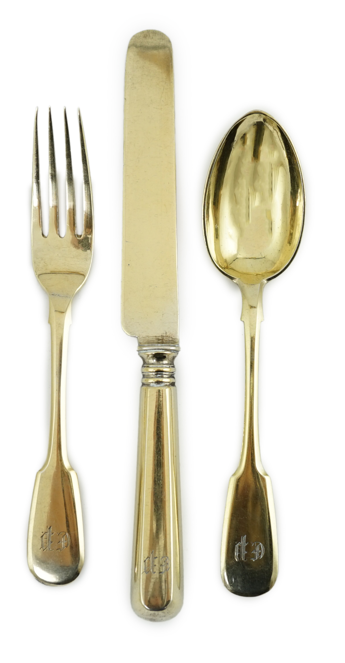 A set of six late 19th century Russian 84 zolotnik silver gilt fiddle pattern dessert spoons, a set of six matching dessert knives and dessert forks, master Alexander Matisyev and A. Krilov, unknown assay master, Moscow,